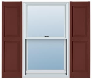 Raised-panel shutters installed beside a window